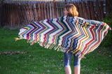 Lindy Pop: knitting pattern by Meghan Jones. Loads of fringe edge a stripey bias lace and twisted stitches shawl.
